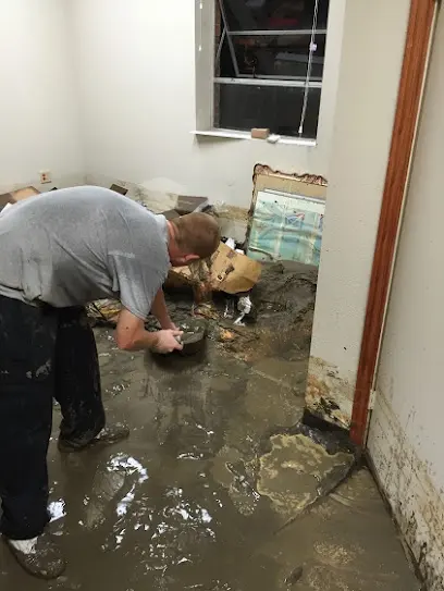 Storm and flood water damage across an Arlington, TX floor
